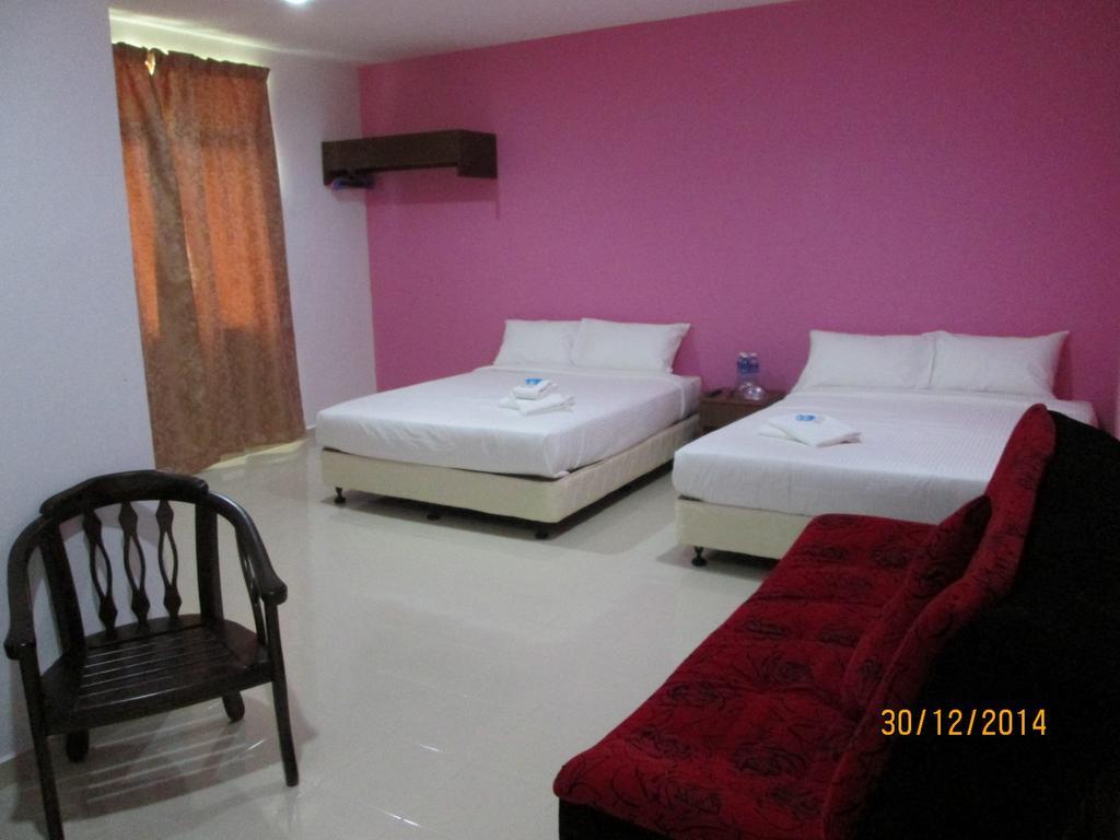 Oyo 275 Senyum Inn Pantai Cenang  Habitación foto