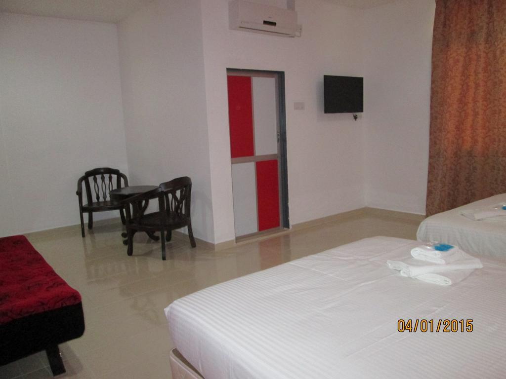 Oyo 275 Senyum Inn Pantai Cenang  Habitación foto